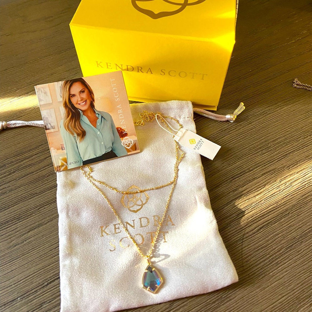 Kendra Scott double strand gold necklace with pendant. Never worn